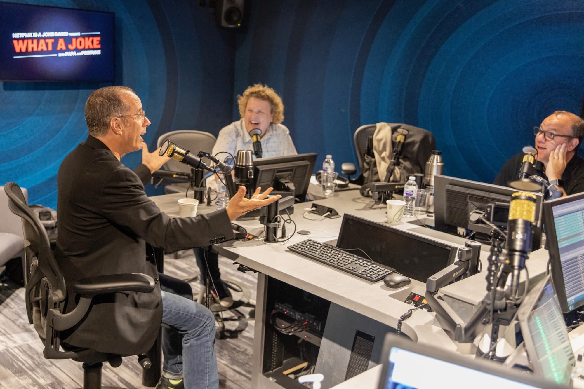 Jerry Seinfeld recording in the What A Joke studio with Fortune Feimster and Tom Papa